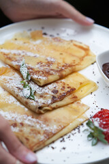Healthy breakfast table with Crepes, blueberries