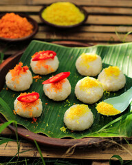 Ketan Serundeng, Sticky Rice with Spiced Shredded Coconut on A Bowl