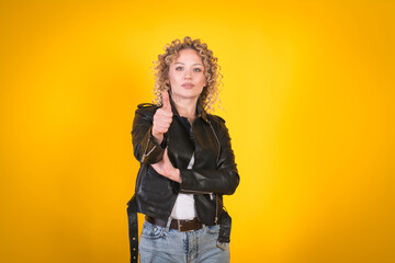 Stylish girl in a black leather jacket