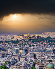 Fototapeta na wymiar Acropolis and Athens urban area panoramic view under dramatic sky, Greece