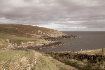 The rocky Irish coastline over looking the Atlantic ocean from County Cork.