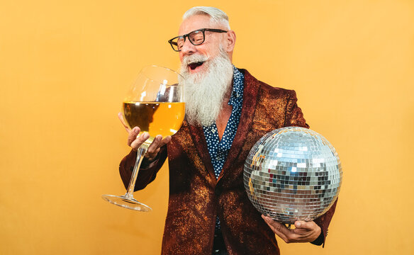 Senior Party Man Celebrating New Year's Eve In Disco Club