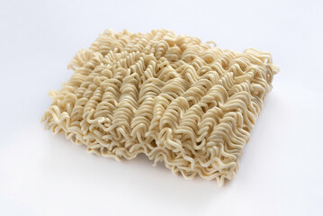 Selective focus of instant noodles isolated on white background.