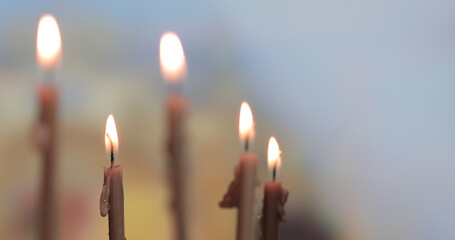 Candles burning on a church altar