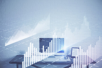 Forex Chart hologram on table with computer background. Multi exposure. Concept of financial markets.