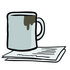 coffee cup on stack of paper
