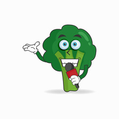 The Broccoli mascot character becomes a host. vector illustration