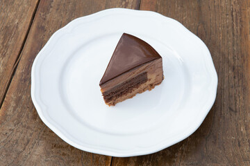 Delicious cake with three different kind of chocolate.