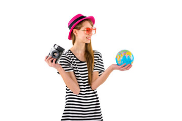 tourist teenage girl holding retro camera, globe isolated on white background.
