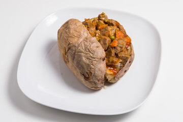 Delicious spicy pulled pork stuffed sweet potato dish
