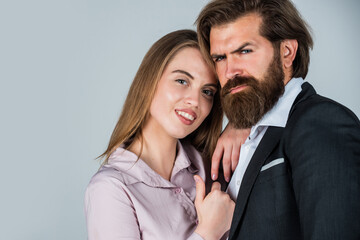 Love time. mature man with girlfriend. romantic relationship and dating. copy space. couple in love. sexy formal couple. bearded man and woman embrace. fashion and beauty. valentines day for them
