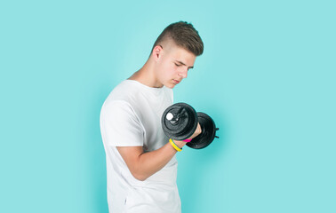 teen boy training with barbells. sport and fitness. teen guy hold dumbbell. sportswear and equipment shop. healthy lifestyle. dieting for athletics. strong man workout in gym