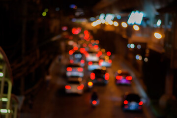 Bokeh from car lights in Bangkok, Thailand, Blurred background.