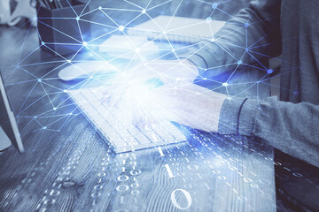 A man working on computer with technology theme drawing. Concept of big data. Multi exposure.