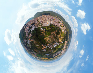 Panoramic aerial little planet view of Narni (Terni, Umbria, Italy), medieval city. Houses made of stone on top of the mountain. Incredible views. Europe travel and vacation concept