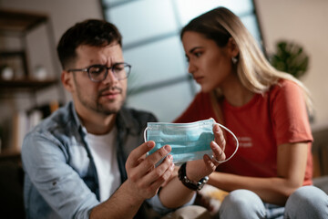 Young man waiting results from the laboratory. Worried man waiting Covid-19 test..