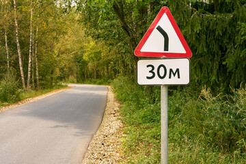 Car road sign dangerous turn