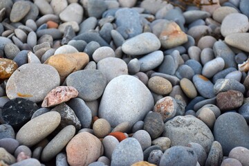 Quality photographic image. Image of beach pebbles. Texture image to decorate.