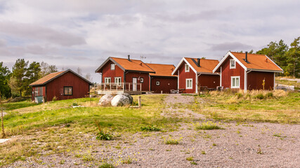 Traditional red wooden holiday homes in Sweden Europe