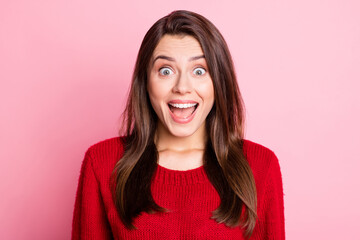 Portrait photo of amazed happy surprised brunette girl staring with opened mouth smiling wearing knitted sweater isolated on pink color background