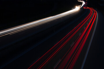 Highway trafic at night. Car lights in the highway with long exposure