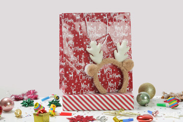 Various gift boxes on the table with Christmas ornaments. Winter's holiday celebration and gifting concept. 
