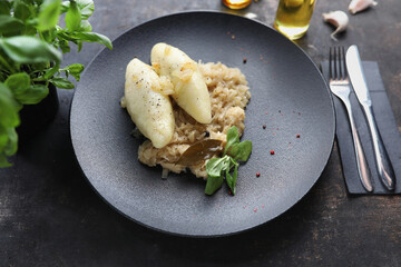 Zeppelins with meat and fried cabbage, Traditional regional dish of Polish kichni. Dish on the plate, culinary photography. © foodandcook