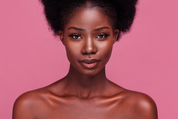 Beautiful portrait of a gorgeous African American fashion model with bare shoulders and afro hair...