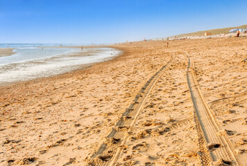 Beach of Atlantic Ocean with tire tracks - Cap Ferret, Aquitaine, France