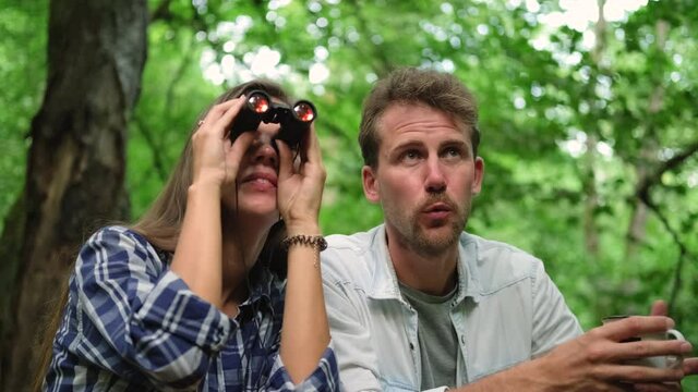 Bird watching with binoculars