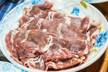 Thai hotpot with Beef.Meat buffet food on plate