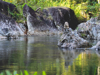 Stacked stones and water streams