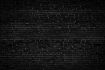 Fototapeta na wymiar Black brick wall. Vintage dark background for creative design.