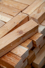 Square wooden planks stacked in rows