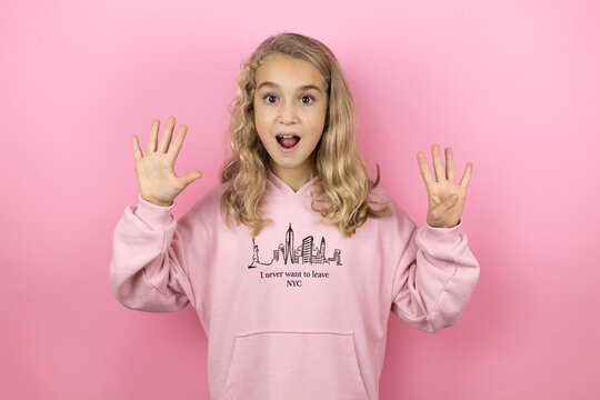 Young Beautiful Child Girl Standing Over Isolated Pink Background Showing And Pointing Up With Fingers Number Nine While Smiling Confident And Happy