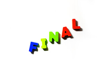 Final word text inscription from wooden colorful letters at white background with shadows, top view, finish, end, last steps concept