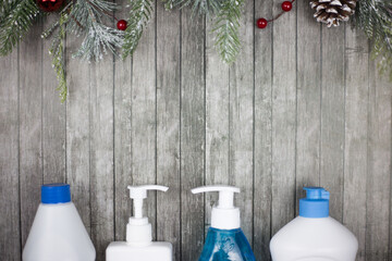 detergents lie on a wooden christmas background. Place for text