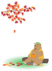 紅葉の下でコーヒーを飲む熊のイラスト