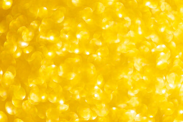 Abstract blurred golden bokeh background, festive and luxury style background