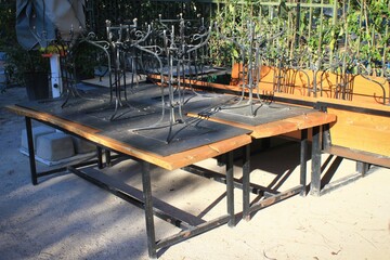 Greece, Athens, November 5 2020 - Chairs, tables and other furniture stacked outside closed cafe-restaurant around Acropolis hill, after the announcement for Covid-19 lockdown.