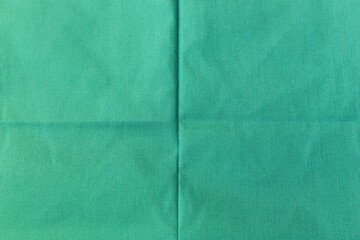 Fototapeta premium Abstract green fabric texture background, green fabric pattern background