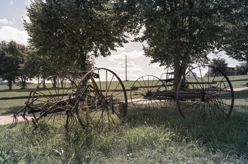 two old horse plow trailer with seat