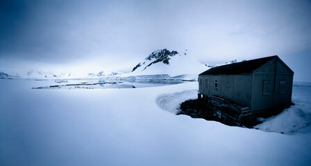 Shack in Winter Landscape