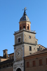 Fototapeta na wymiar Municipal historical tower with ancient clock, Modena, Italy