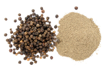 Black pepper isolated on white background, top view. Close-up of black ground pepper on a white background. Black ground pepper on a white background, top view. Dry peppers on a white background.