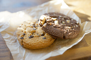 Large vanilla and chocolate biscuits with nuts
