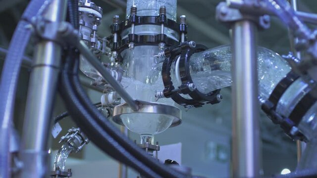 Water flows in a transparent pipe. Transparent pipe to show water flows inside the water supply system. Testing of pumps for oil flow