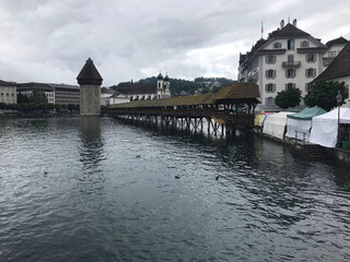 Historic city center of Lucerne with famous Chapel Bridge on Reuss River in Switzerland
