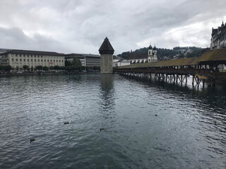 Historic city center of Lucerne with famous Chapel Bridge on Reuss River in Switzerland