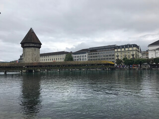 Historic city center of Lucerne with famous Chapel Bridge on Reuss River in Switzerland
